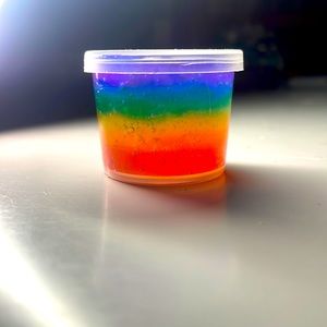 Rainbow hot n’ gloss stretch slime from Sassy Slimes